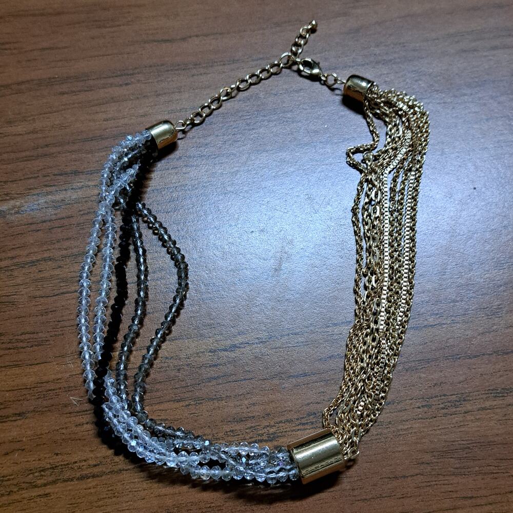 Multi strand Goldtone chain multi strand clear smoke black beads necklace